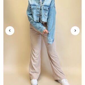Hope's Light Blue Denim Jacket and Beige Pants
